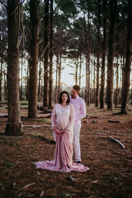 20180614-DSC_9859 Couple standing in The Pines Wanneroo, Perth during a golden hour maternity photography session