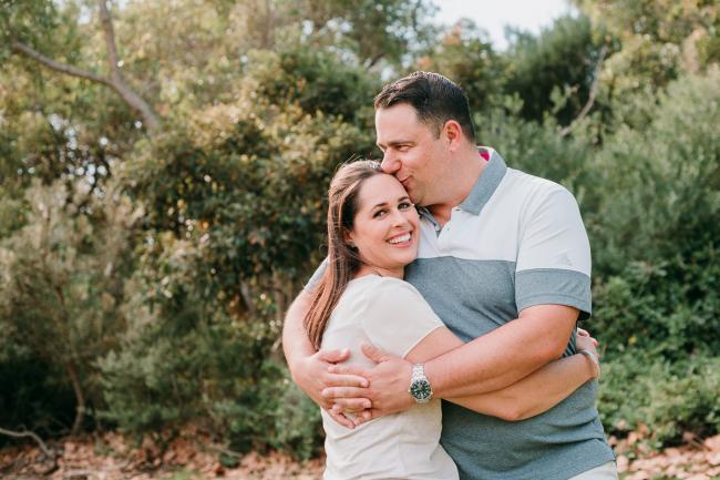 Couple hug during family photography Perth session