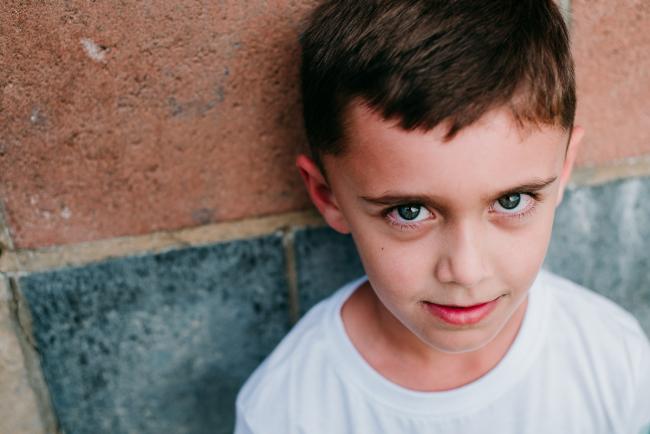 Little boy looking at the camera during family photography Perth session
