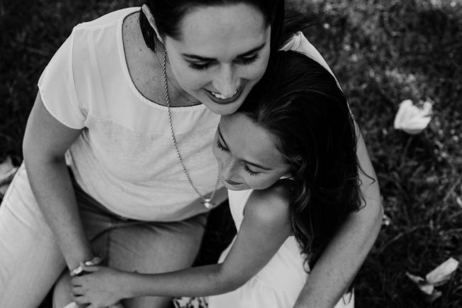 black and white image of mother and daughter embracing during family photography Perth session