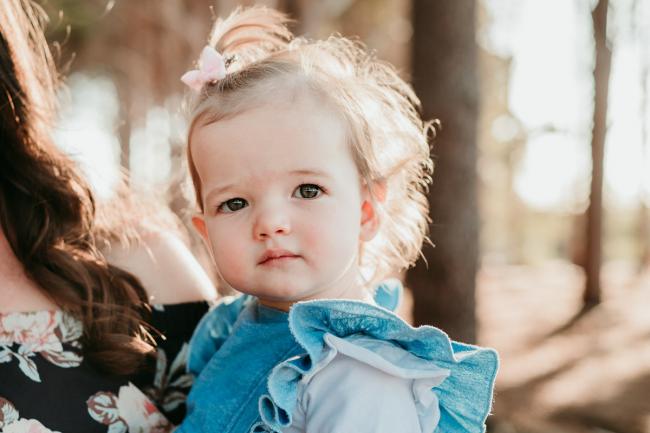 20180518-20180518-DSC_3877 Little girl looks at camera during family photography Perth session at The Pines Wanneroo