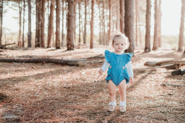 20180518-20180518-DSC_3934 Little girl stands in forest during family photography Perth session at The Pines Wanneroo