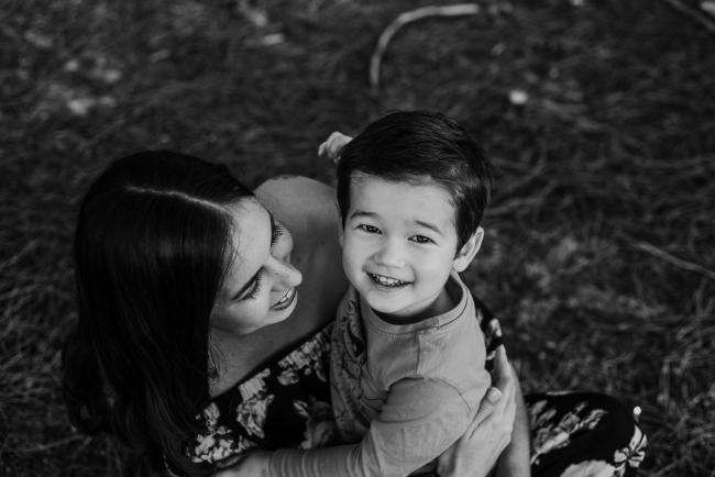 20180518-20180518-DSC_3977-2 Black and white image of mother and son during family photography Perth session at The Pines Wanneroo