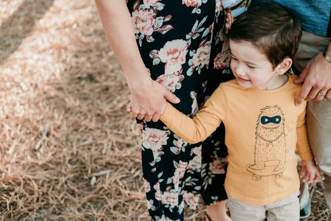 20180518-20180518-DSC_4212 Little boy holding his mothers hand during family photography Perth session at The Pines Wanneroo