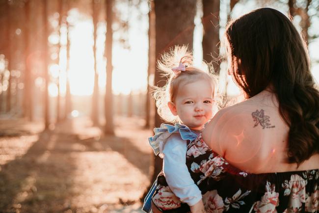 20180518-20180518-DSC_4981-2 Daughter peeking over mothers shoulder during golden hour during family photography Perth session at The Pines Wanneroo
