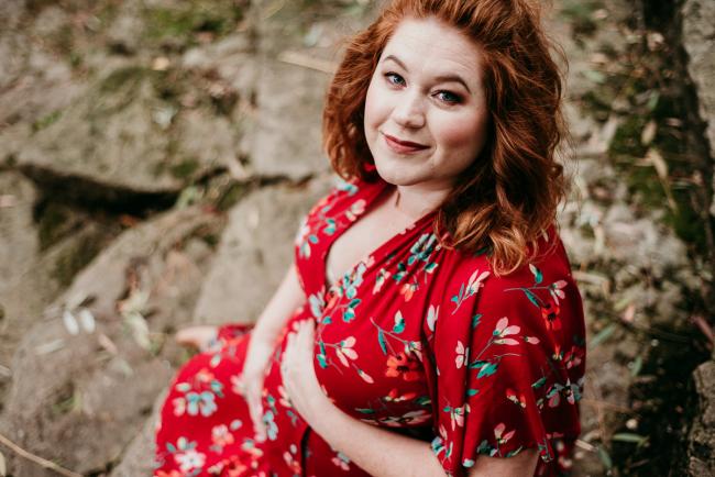 20180609-20180609-DSC_7103 Pregnant woman sitting and looking up during maternity photography Perth session at John Oldham Park
