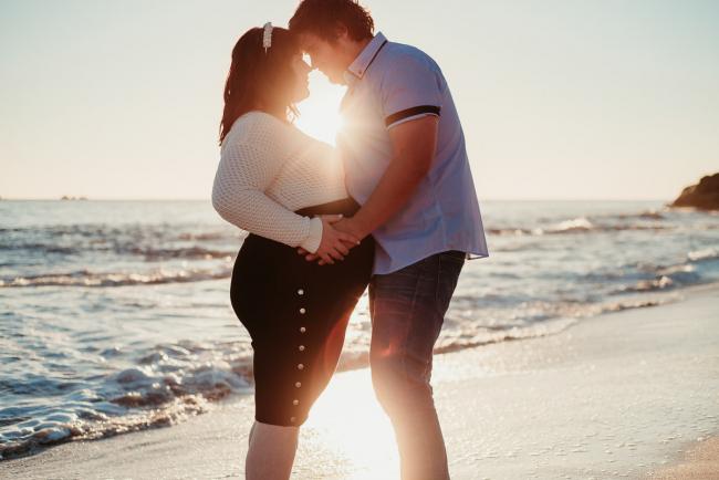 20180616-20180616-DSC_1068 Pregnant couple touching foreheads during maternity photography Perth session at Burns Beach