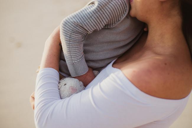20180703-DSC_5667 Little boy hugging his mother during a maternity photography Perth session at Burns Beach