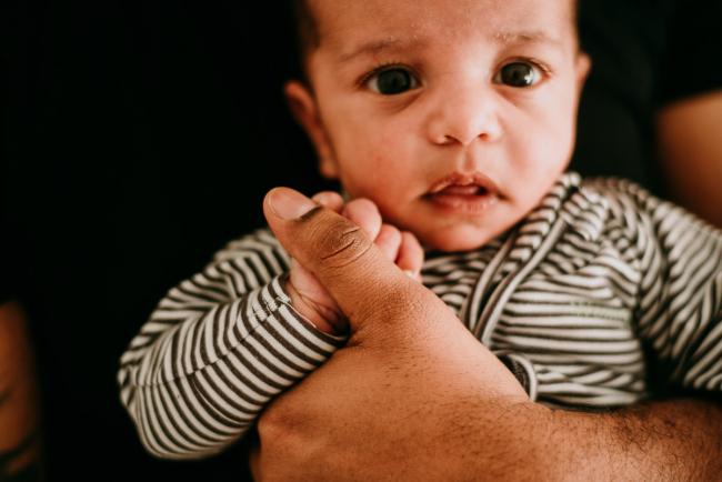 20180706-20180706-DSC_6368 New baby holding fathers thumb during lifestyle newborn photography Perth session