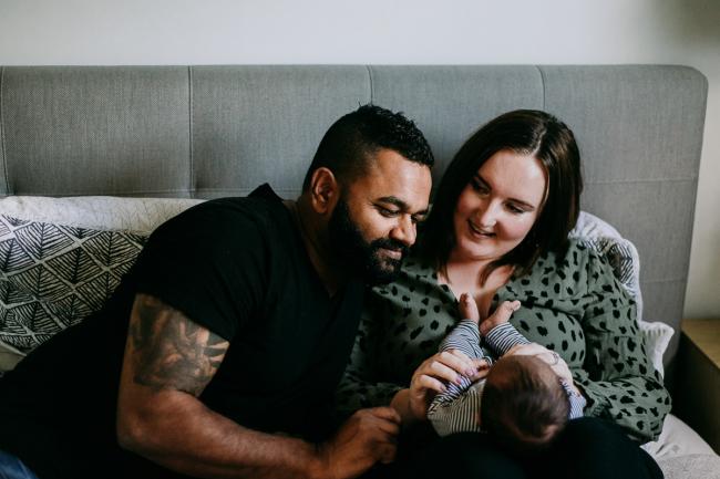 20180706-20180706-DSC_6670 mother and father smiling at new baby during lifestyle newborn photography Perth session