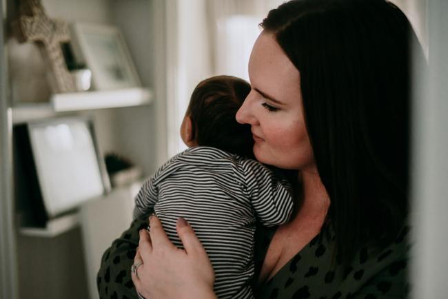 20180706-20180706-DSC_6828 mother holding new baby during lifestyle newborn photography Perth session