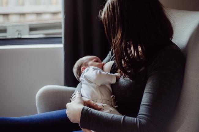 New baby breastfeeding during a Perth newborn photography session