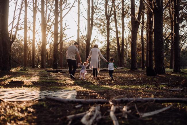 20180901-DSC_0998 Family of four holding hands and walking away during family photography Perth session at The Pines Wanneroo