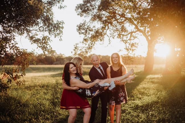 20180909-DSC_5571 Father and two daughters carry their mother during golden hour family photography Perth session at Perry's Paddock