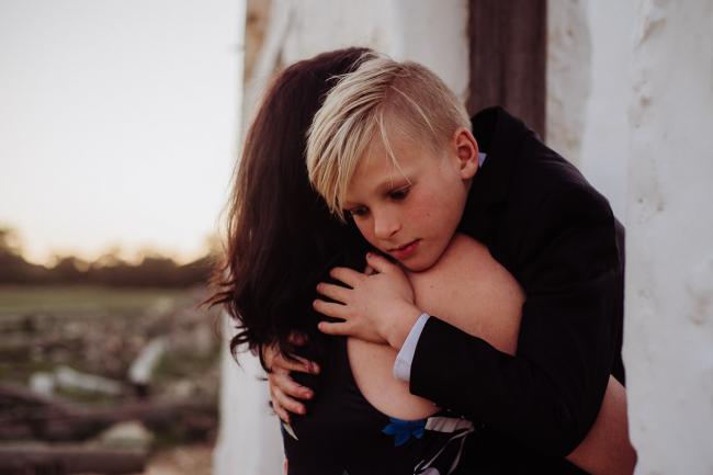 20180909-DSC_5979 Son embracing his mother during golden hour family photography Perth session at Perry's Paddock