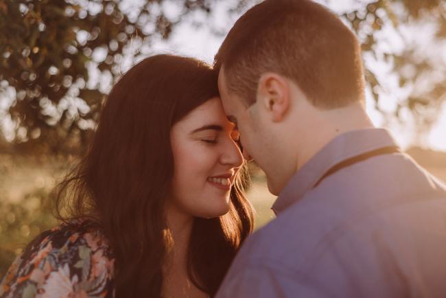 Couple touching foreheads during a Perth couples session at Perry's Paddock