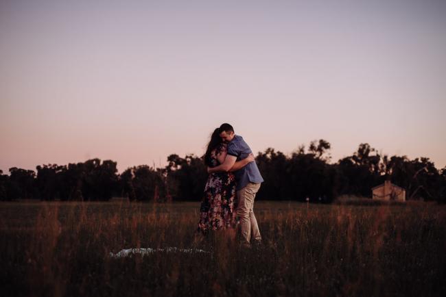 Couple hugging during a couples photography session at Perry's Paddock, Perth