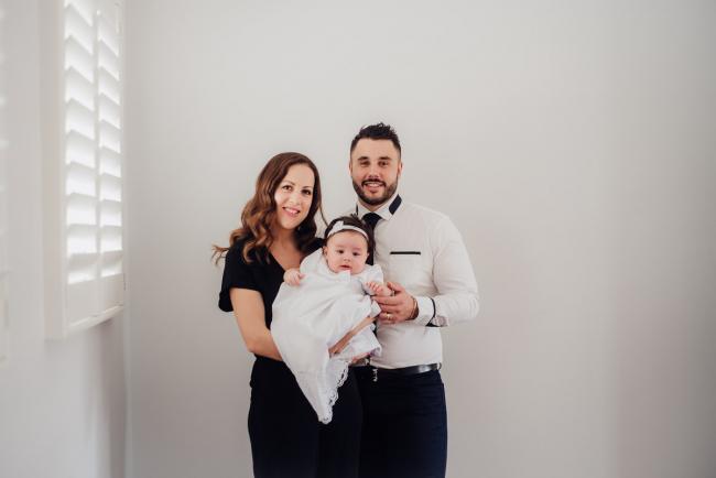 20180930-DSC_9487 Mother and father holding their baby who is being christened during events photography Perth session