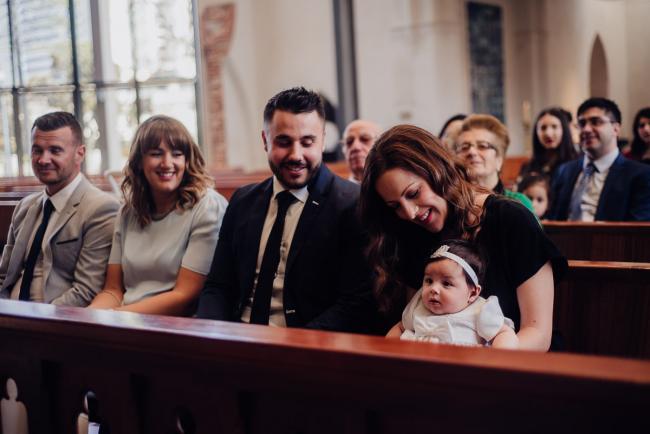 20180930-DSC_9872 Baby sits on her mothers lap during christening ceremony during events photography Perth session