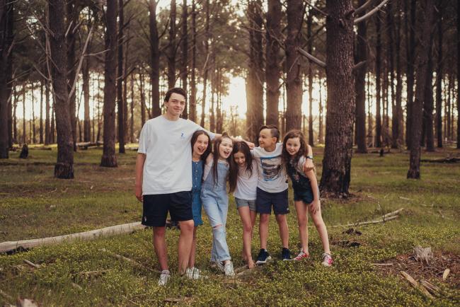 20181005-DSC_0590 Cousins standing together during Perth family photography session at The Pines Wanneroo