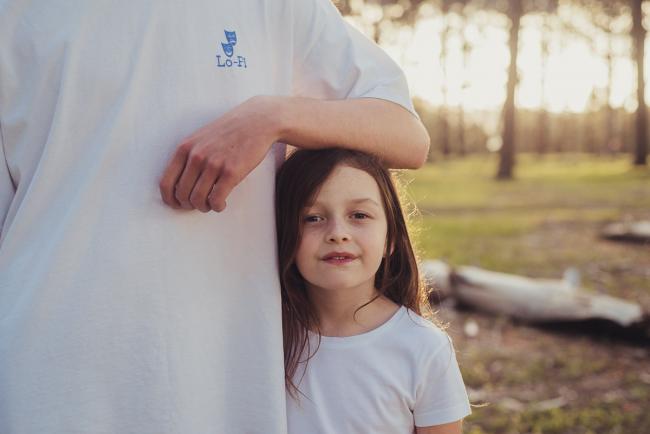 20181005-DSC_0956 Big brother leaning his arm on little sisters head during Perth family photography session at The Pines Wanneroo