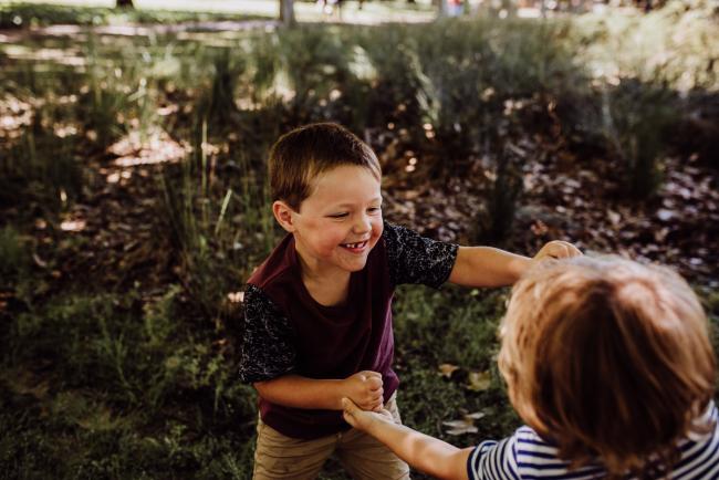 20181104-DSC_7164 Brothers play fighting during a mini session with Perth family photographer at Hyde Park