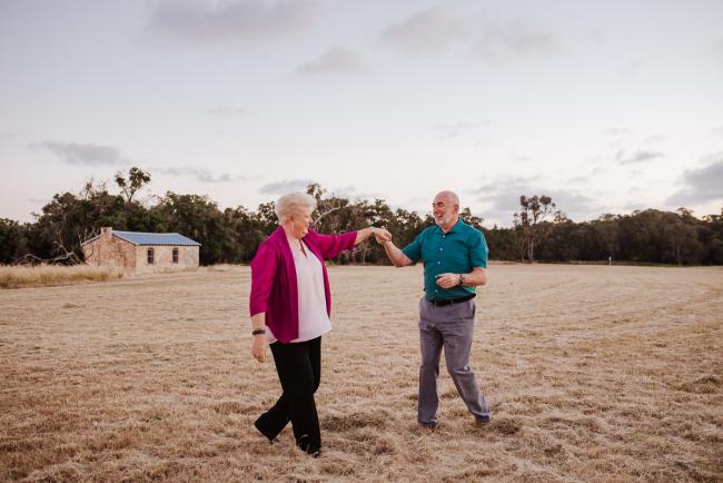Couple dancing during a Perth family session at Perry's Paddock