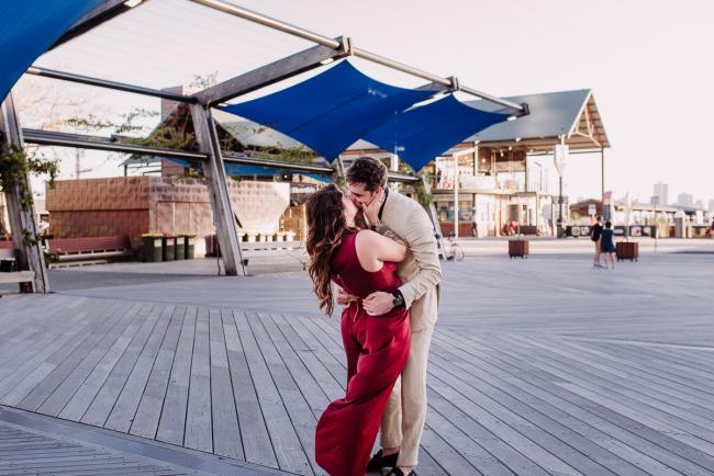 20181202-DSC_3112 Couple kissing during Perth events photography session at The Bell Tower Perth