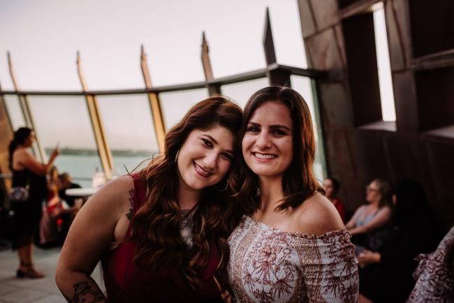 20181202-DSC_3460 Two women smiling during Perth events photography session at The Bell Tower Perth