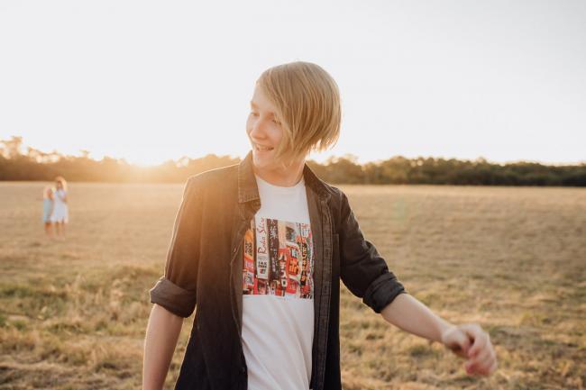 Boy at golden hour during an extended family photography session at Perry's Paddock in Perth