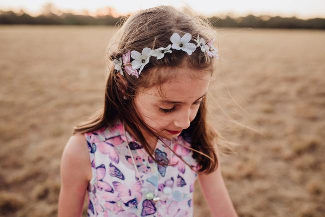 Little girl during an extended family photography session at Perry's Paddock in Perth