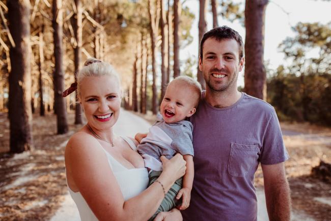 Mother, father and their son during an extended family photography session at The Pines Wanneroo in Perth