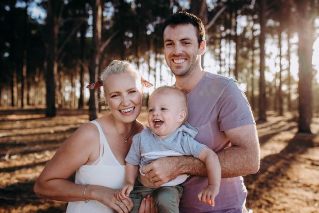 Parents and their son during an extended family photography session at The Pines Wanneroo in Perth