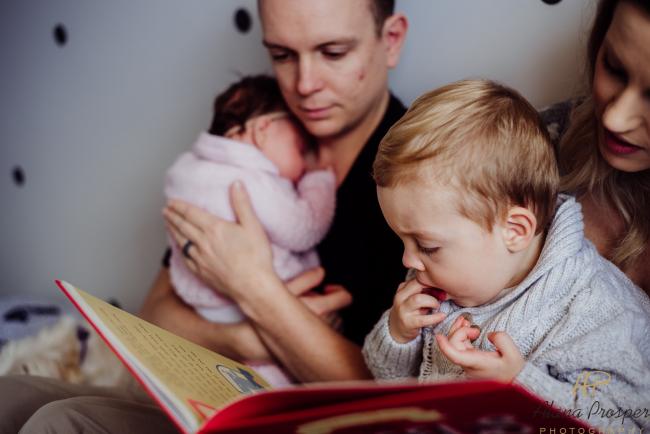 20180703-DSC_5332 Family of four read a book during a Perth newborn photography session