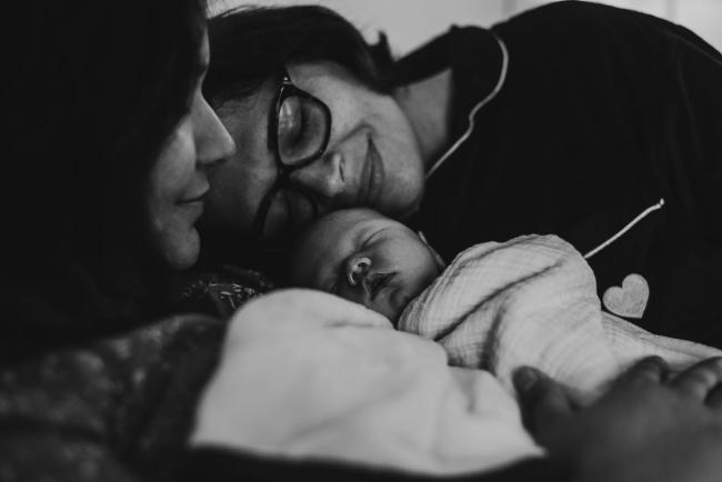 20180724-DSC_0010 Black and white image of three generations - new baby son, mother and grandmother, all laying with heads close during a Perth newborn lifestyle session