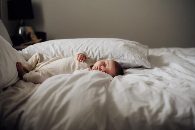 20180725-DSC_0960 New baby laying asleep on the bed during a Perth newborn photography session