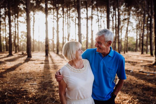 Couple looking at each other during a Perth family session at The Pines