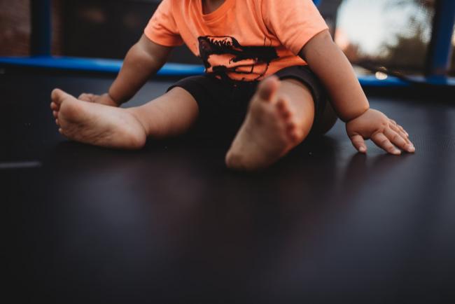 Close up of little boys feet on the trampoline with Perth family photographer