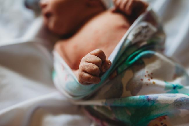 Close up of new baby's hand during a Perth Fresh 48 photography session