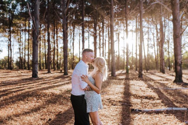 Perth-Couples-Photography-5-of-27 Couple kissing at The Pines Wanneroo during a Golden Hour Perth couples photography session