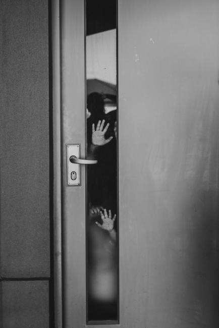 Perth-Family-Photographer-18-of-26 Black and white images of hands pressed up against the window with Perth family photographer