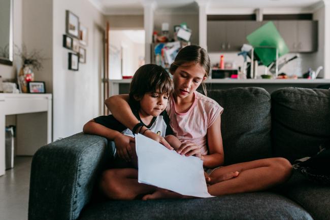 Perth-Family-Photographer-19-of-26 Girl and boy sitting on the couch with Perth family photographer