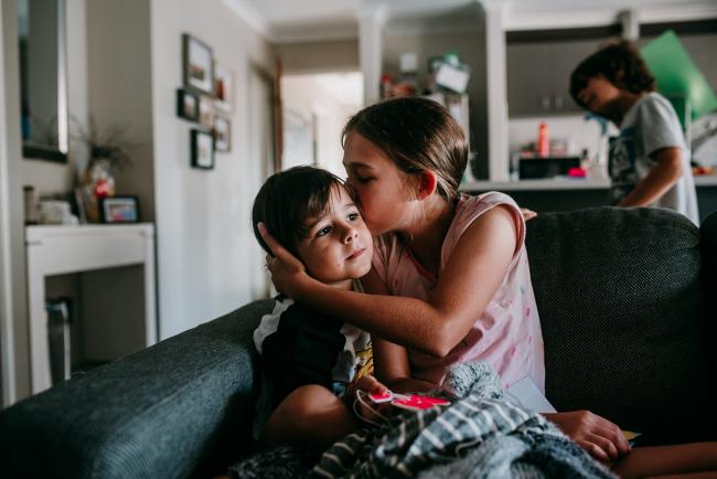 Perth-Family-Photographer-25-of-26 Girl kissing her little brother with Perth family photographer