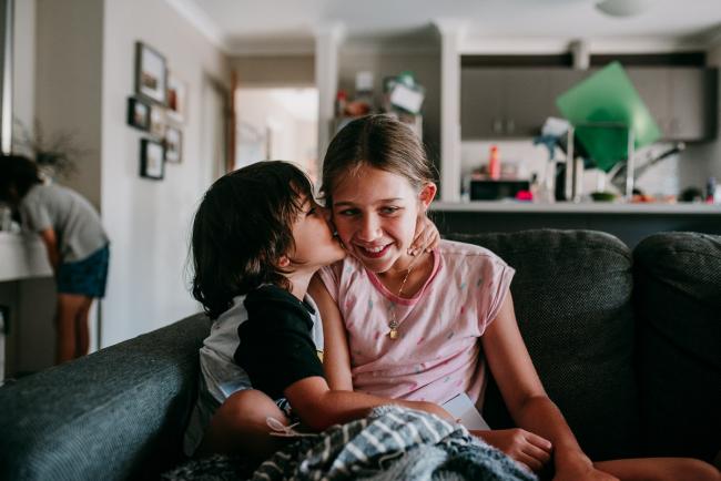Perth-Family-Photographer-26-of-26 Brother kissing his big sister with Perth family photographer