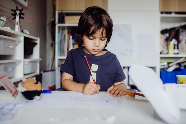 Perth-Family-Photographer-8-of-26 Little boy drawing at a table with Perth family photographer