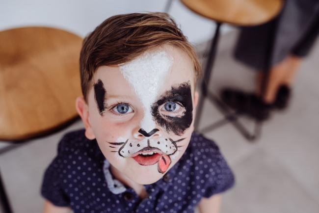 Little boy in dog face paint during a birthday party captured by Perth events photographer