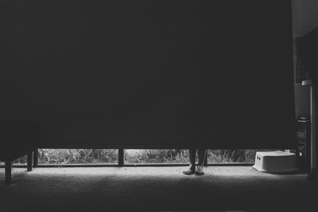 20190403-DSC_9838 black and white image of little feet under blinds with Perth family photographer