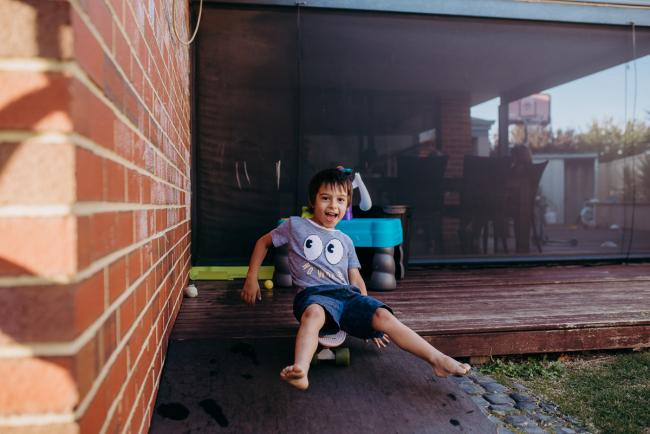 20190406-DSC_0085 Little boy sliding down a ramp on a skateboard with Perth lifestyle family photographer