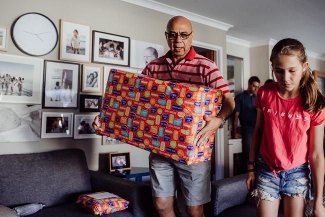 20190406-DSC_9945 Grandfather walking in with a present with Perth lifestyle family photographer