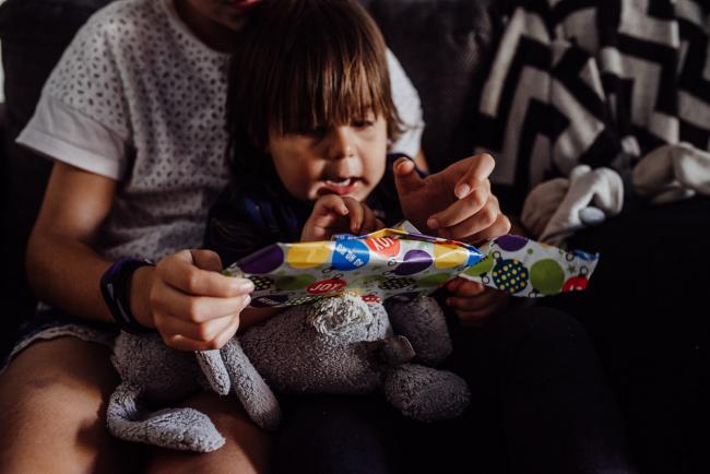 20190412-DSC_1627 Little boy opening his birthday present with Perth lifestyle family photographer